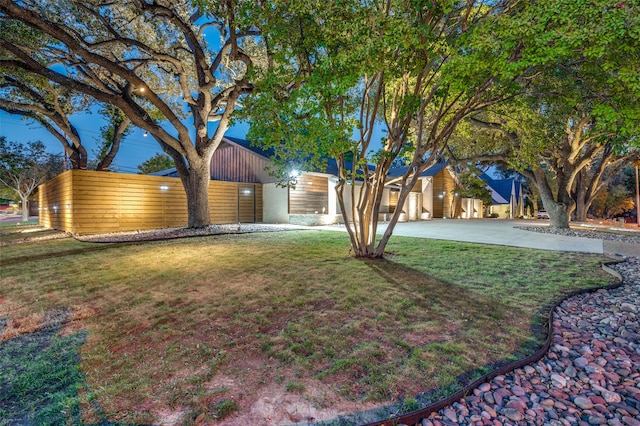 view of yard featuring a garage