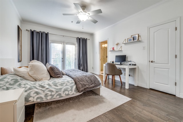 bedroom featuring hardwood / wood-style flooring, ensuite bath, ceiling fan, and crown molding