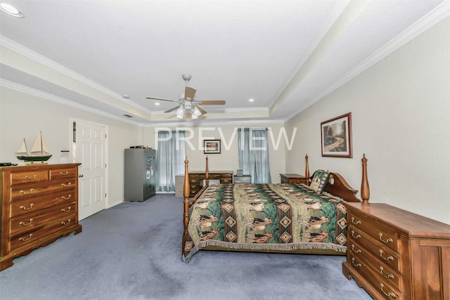 bedroom featuring carpet, ceiling fan, a raised ceiling, and crown molding