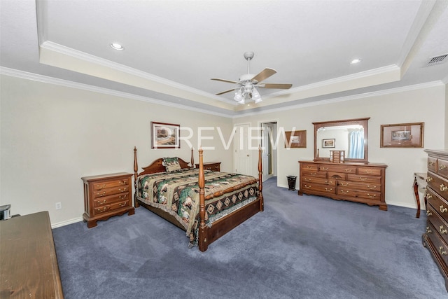 bedroom featuring a tray ceiling, dark carpet, ceiling fan, and crown molding