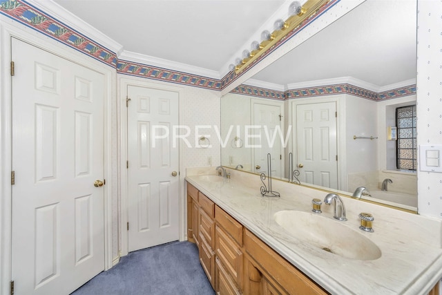 bathroom with vanity and ornamental molding