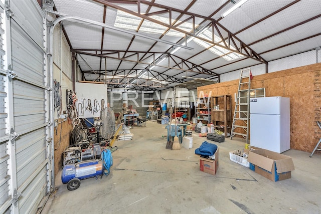 garage with white refrigerator