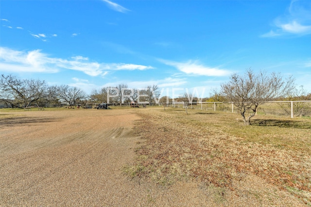 exterior space with a rural view