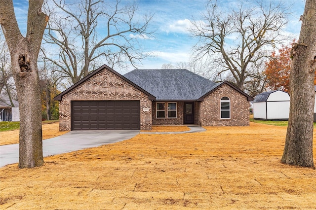 ranch-style house featuring a garage and a front lawn