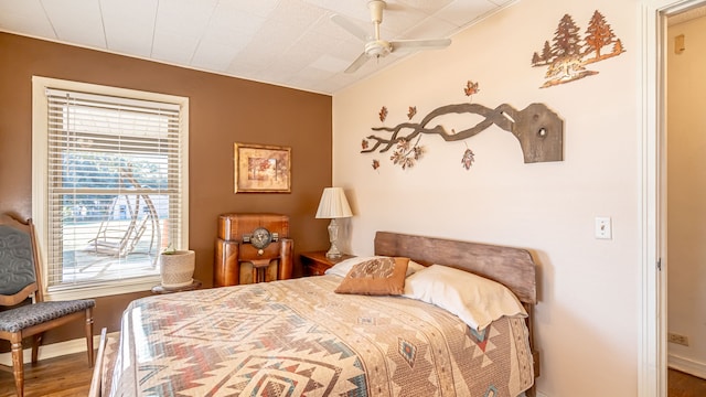 bedroom featuring wood-type flooring and ceiling fan