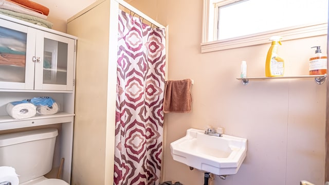 bathroom with sink and toilet