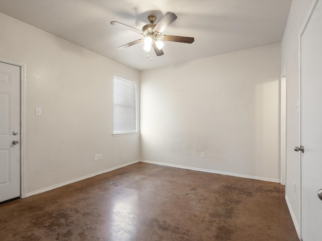 spare room with ceiling fan