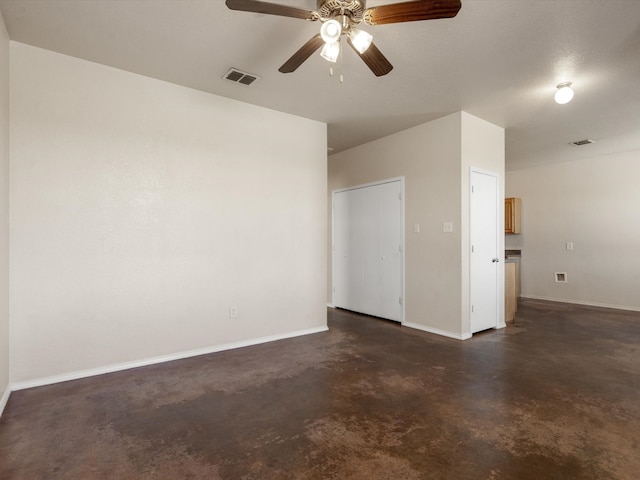 spare room with ceiling fan