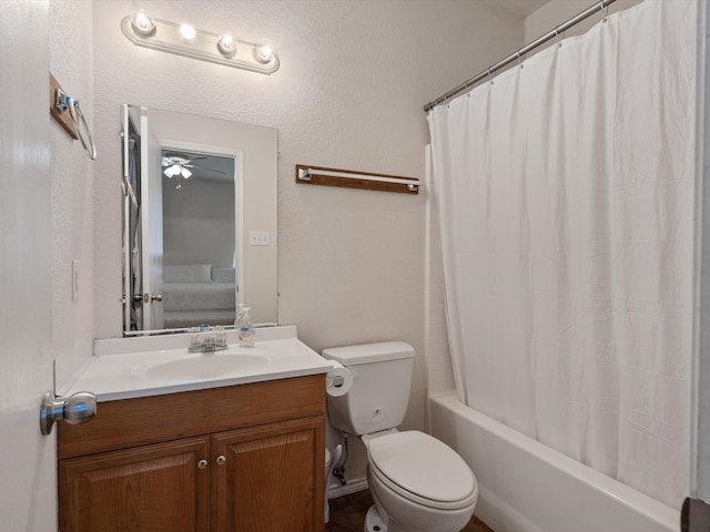 full bathroom with vanity, toilet, shower / tub combo, and ceiling fan