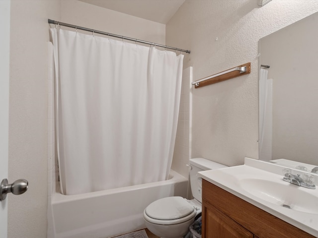 full bathroom featuring vanity, shower / tub combo with curtain, and toilet