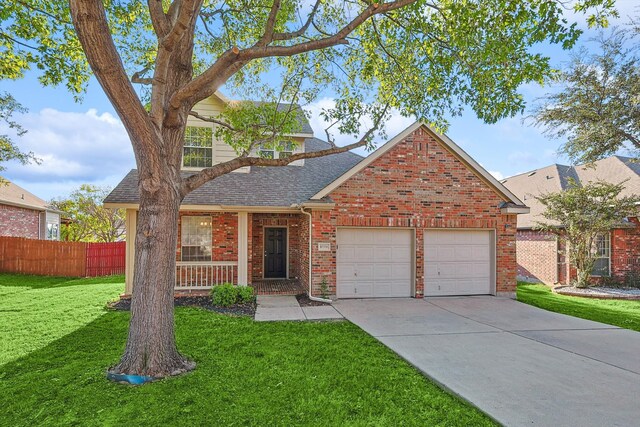 front facade with a garage, a front lawn, and a porch