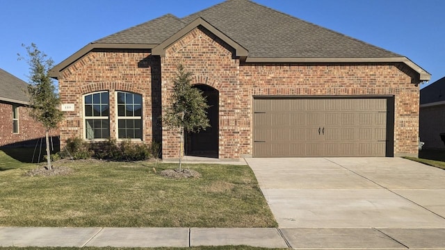 front facade with a front lawn