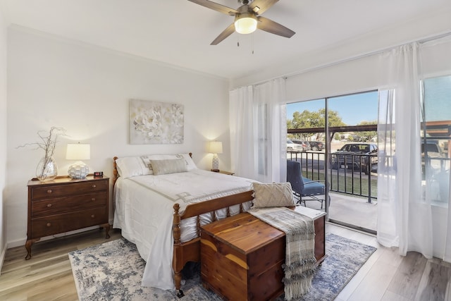 bedroom featuring crown molding, light hardwood / wood-style floors, access to outside, and ceiling fan