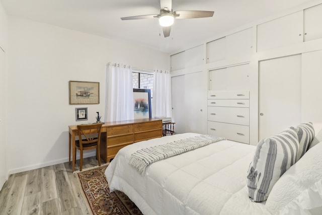 bedroom featuring ceiling fan and light wood-type flooring