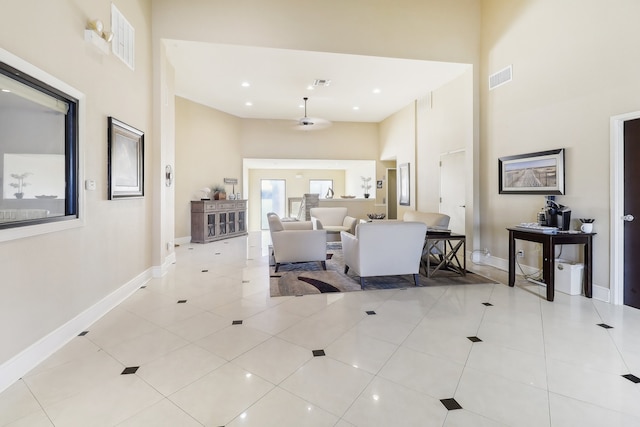 interior space with a high ceiling