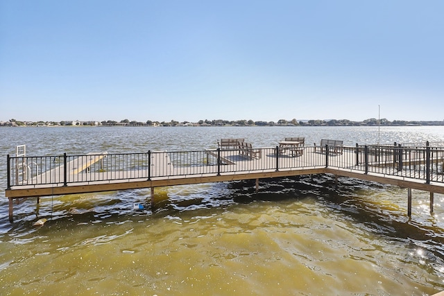 view of dock with a water view