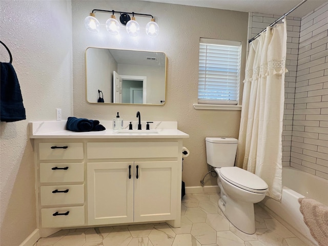 full bathroom featuring toilet, shower / bath combo, and vanity