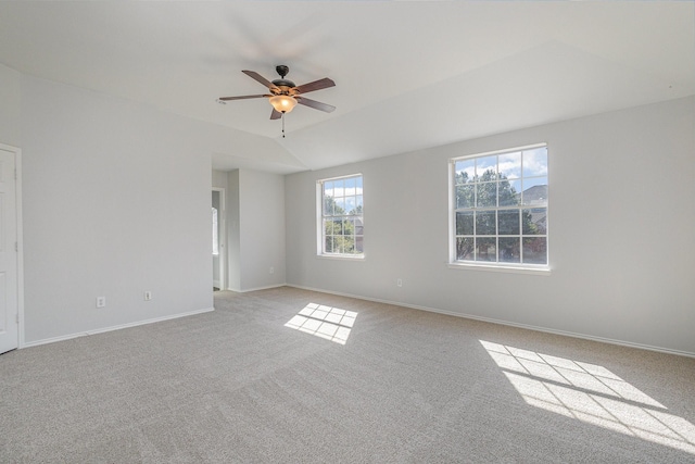 spare room with light carpet and ceiling fan