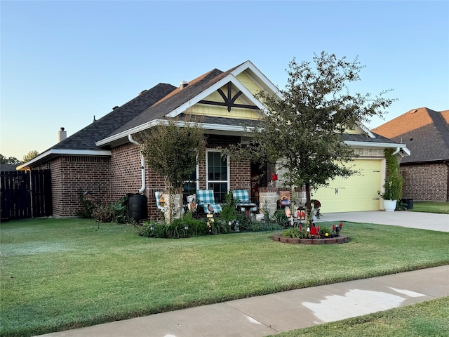 view of front facade featuring a front lawn and a garage