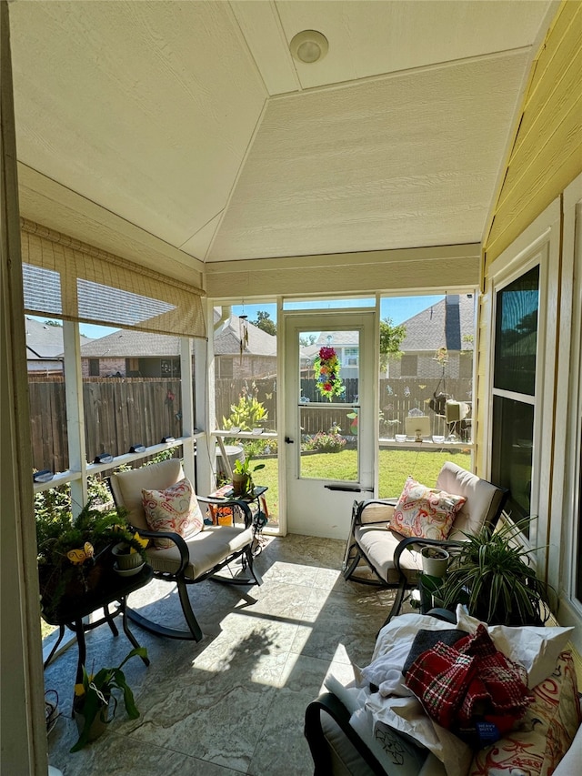 sunroom with vaulted ceiling