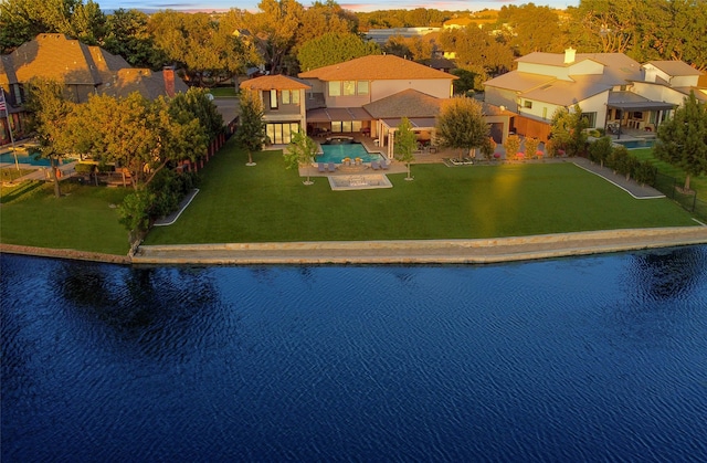 exterior space with a water view