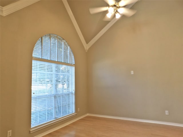 empty room with ceiling fan, ornamental molding, lofted ceiling, and light wood-type flooring