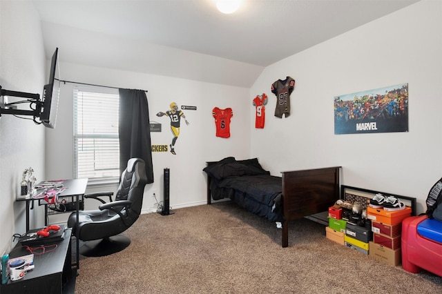 carpeted bedroom with vaulted ceiling