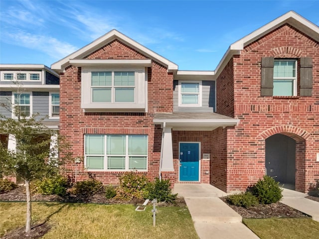 3941 Hometown Blvd, Forney, TX 75126 - view of front facade with a front lawn and brick siding