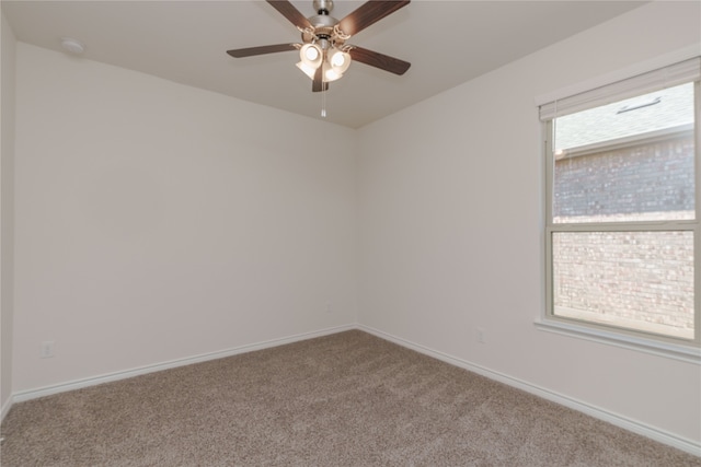 carpeted empty room with ceiling fan