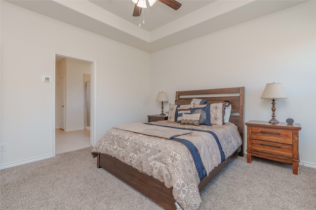 bedroom with ceiling fan and light carpet