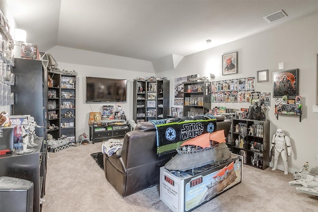 living room featuring light carpet and lofted ceiling