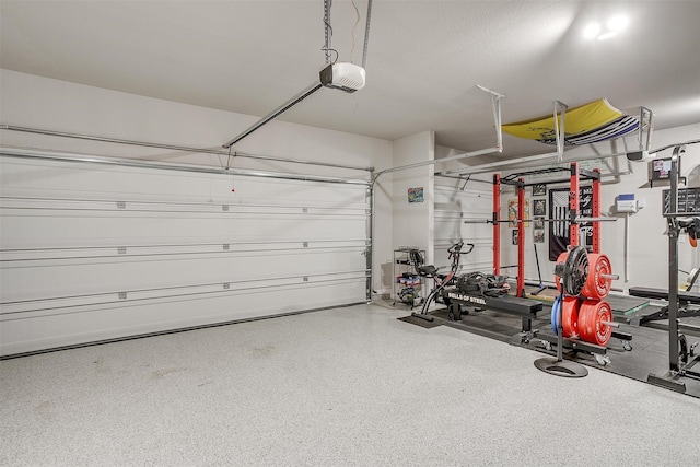 garage featuring a garage door opener