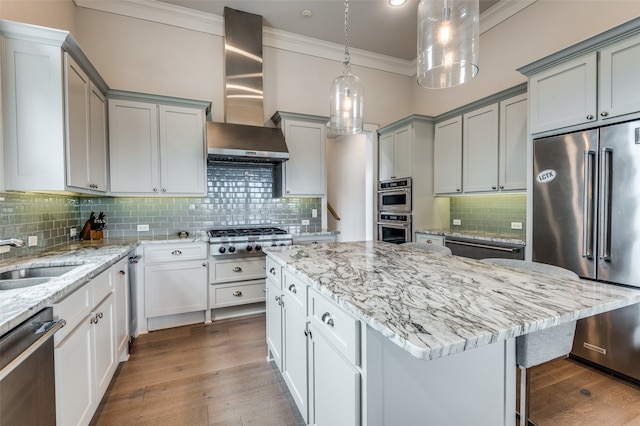 kitchen featuring gray cabinetry, backsplash, and stainless steel appliances