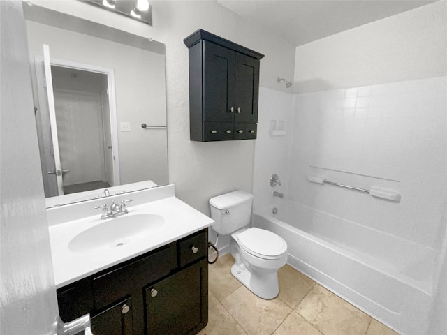 full bath with washtub / shower combination, tile patterned floors, vanity, and toilet