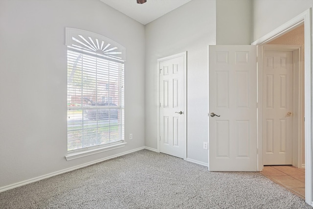 unfurnished bedroom with carpet