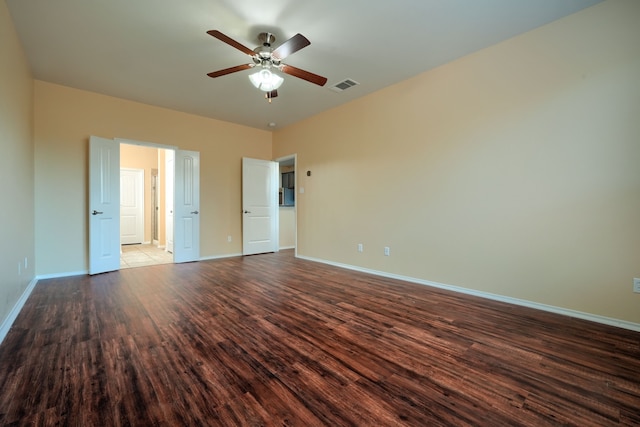 unfurnished bedroom featuring ceiling fan and wood-type flooring