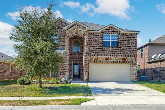 front facade featuring a front yard and a garage