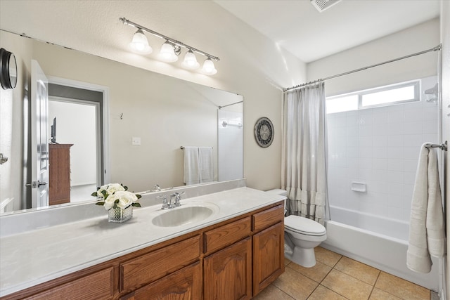 full bathroom with toilet, shower / bath combination with curtain, vanity, and tile patterned floors