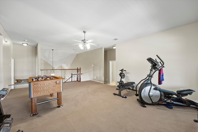 exercise room featuring ceiling fan and light colored carpet