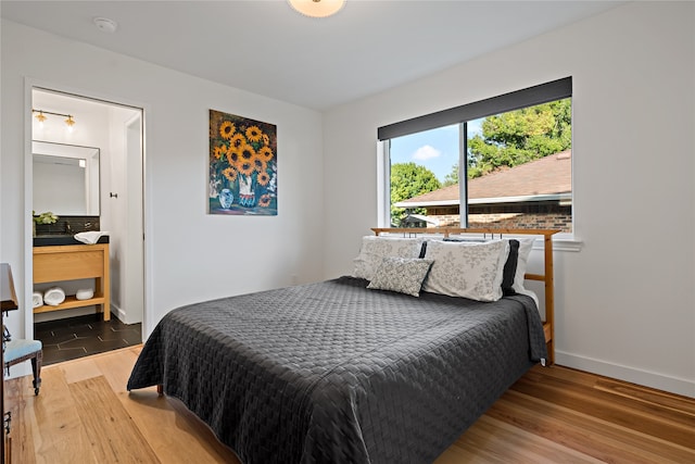 bedroom featuring hardwood / wood-style floors