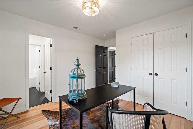 home office featuring hardwood / wood-style flooring