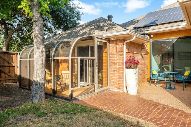 rear view of house featuring a patio