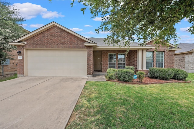 single story home featuring a front yard and a garage