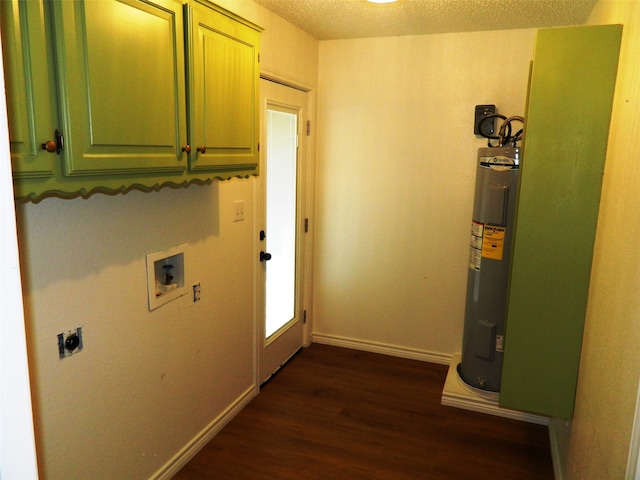 clothes washing area featuring electric dryer hookup, cabinets, electric water heater, hookup for a washing machine, and dark hardwood / wood-style floors