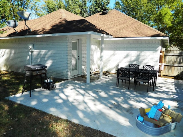 back of property featuring a patio area