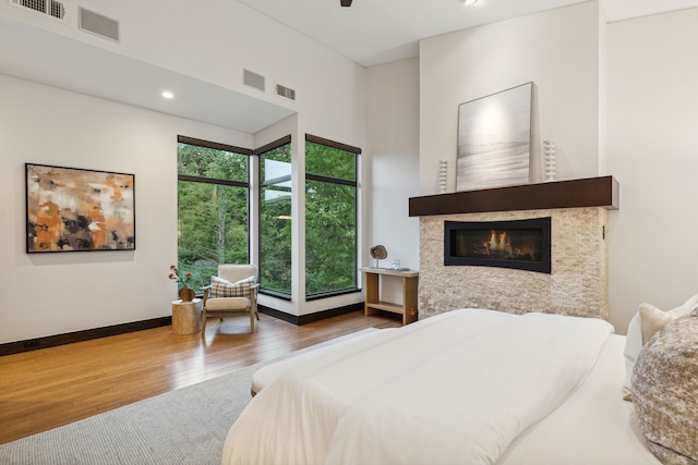 bedroom featuring wood-type flooring and ceiling fan