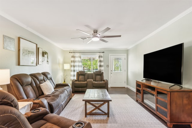 living room featuring crown molding, hardwood / wood-style floors, and ceiling fan