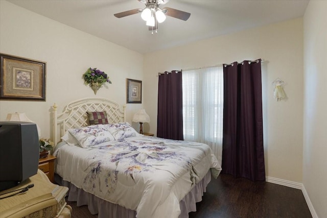 732 E Bullock St, Denison, TX 75021 - bedroom featuring baseboards, ceiling fan, and wood finished floors