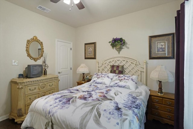 732 E Bullock St, Denison, TX 75021 - bedroom with baseboards, ceiling fan, and visible vents