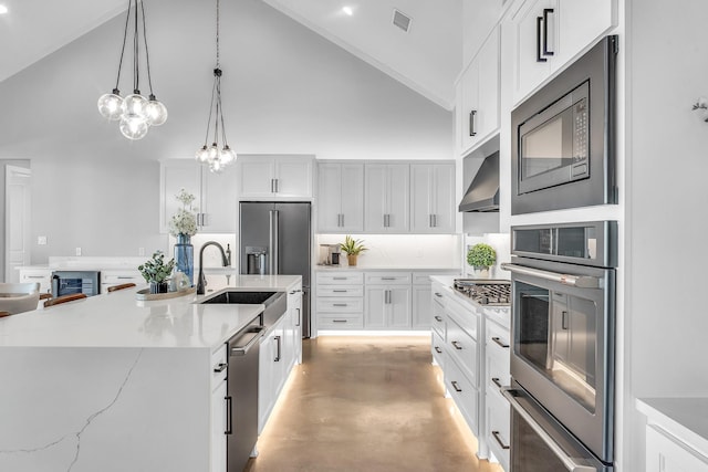 kitchen featuring stainless steel appliances, exhaust hood, high vaulted ceiling, white cabinets, and an island with sink